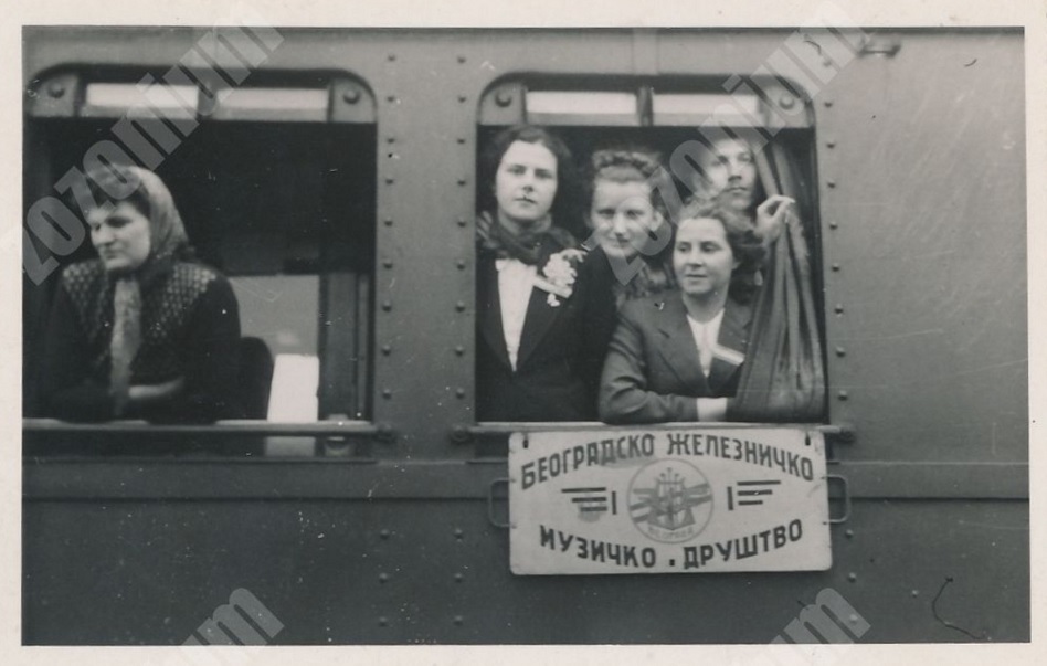 281_001 REAL PHOTO 1940 Women in train Beogradsko Zeleznicko Muzicko Drustvo,.jpg